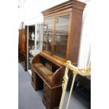 A Victorian mahogany cylinder bureau bookcase.