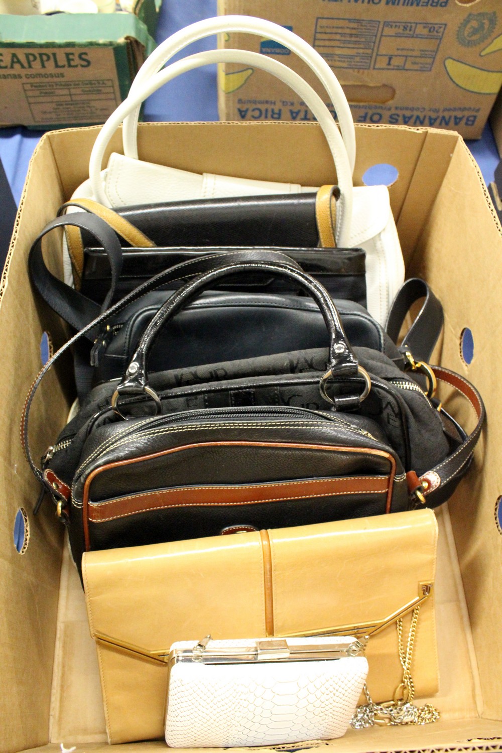 A collection of ladies' handbags.