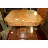 An Art Deco burr walnut pedestal table.