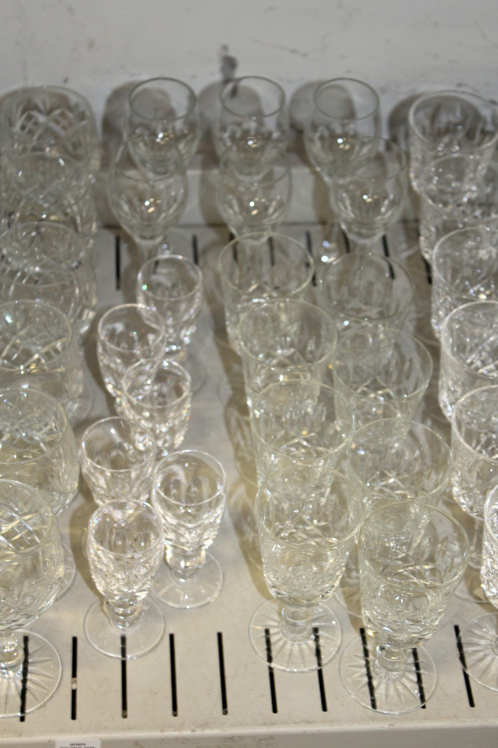 A shelf of cut glass drinking glasses. - Image 4 of 5