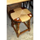 A rush seated stool.