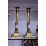 A pair of F & Co patent brass candlesticks.