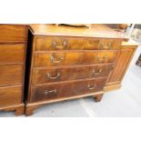 A George III mahogany straight front four drawer chest on bracket feet.