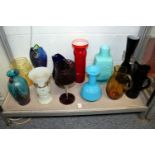 A good collection of colourful glassware to include vases, bowls etc.