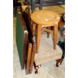 Two stools, a head and footboard and a folding Bridge table.
