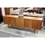 Nils Jonsson, Sweden, a Troeds Gigant teak sideboard with four central drawers flanked by a pair