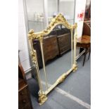 A large decorative wall mirror 4ft 8ins high x 4ft 8ins wide.