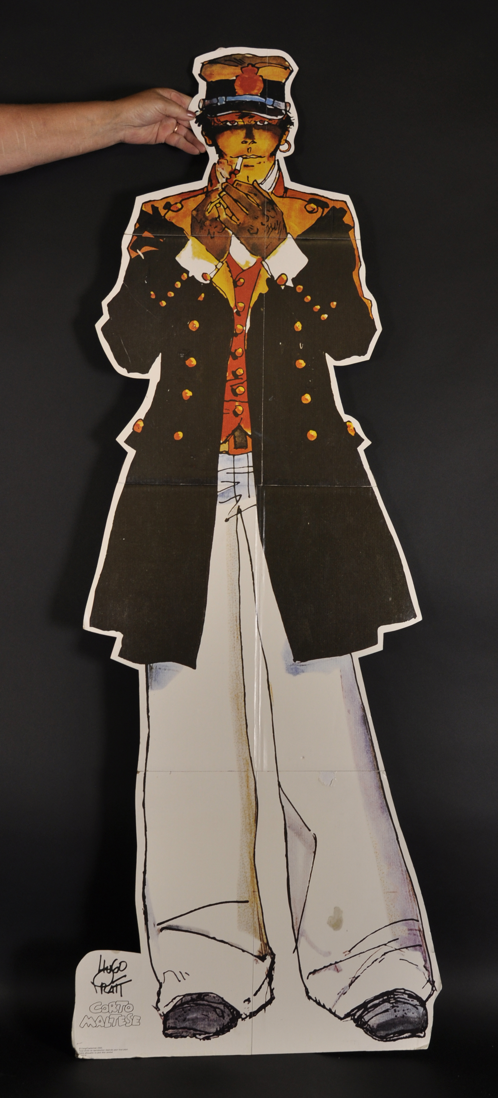 A Cardboard Cut-Out of a Hugo Pratt Figure. - Image 2 of 2