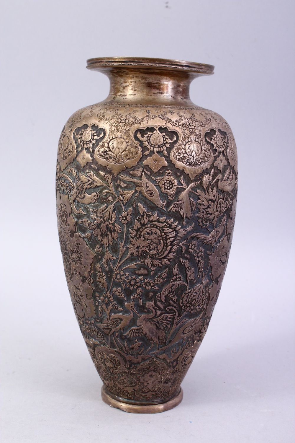 A 18TH / 19TH CENTURY IRANIAN CARVED SILVER VASE, with a multitude of decoration depicting flora and - Image 4 of 12
