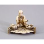 A GOOD JAPANESE MEIJI PERIOD CARVED IVORY OKIMONO, the okimono carved to depict a seated fruit