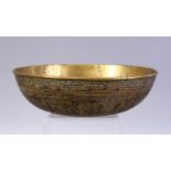 A GOOD QAJAR CALLIGRAPHIC CAST BRASS BOWL, with panels of figures and bands of calligraphy, 20cm.