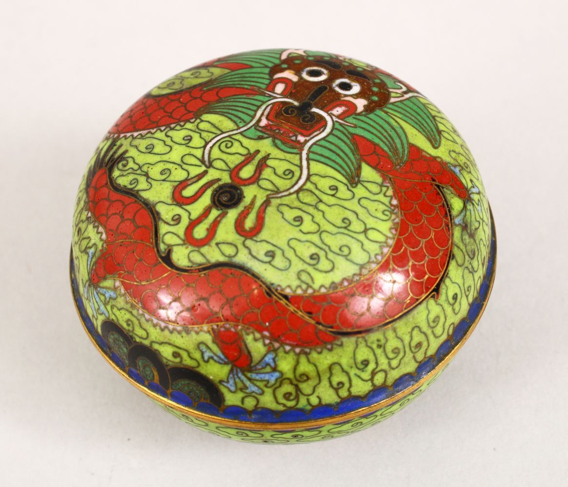 A 19TH / 20TH CENTURY CHINESE CLOISONNE CIRCULAR POT & COVER, decorated upon an apple green ground