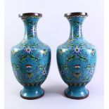 A LARGE PAIR OF 19TH CENTURY CHINESE CLOISOINNE VASES, each decorated upon a blue ground ith