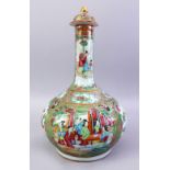 A GOOD 19TH CENTURY CHINESE CANTON FAMILLE ROSE PORCELAIN BOTTLE VASE & LID, with paneled decoration