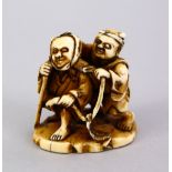 A JAPANESE MEIJI PERIOD CARVED IVORY NETSUKE - TWO DRUNK MEN, the two figures both bearing bangs