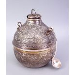 A GOOD 19TH CENTURY IRANIAN / ISLAMIC SILVER TEA CADDY WITH SPOON, the body of the caddy carved with