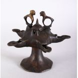 A GOOD POSSIBLY 13TH CENTURY ISLAMIC PERSIAN BRONZE CALLIGRAPHIC OIL LAMP, with five spouts and