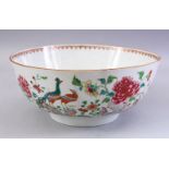 A GOOD 18TH CENTURY QIANLONG FAMILLE ROSE PORCELAIN BOWL, decorated with scenes of birds amongst