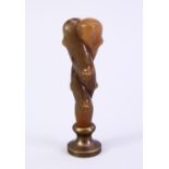 A GOOD 19TH CENTURY CHINESE CARVED RHINO HORN HANDLE SEAL, carved in the form of natural subject,