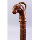 A FINE 18TH/19TH CENTURY INDIAN CEREMONIAL COPPER MACE, with ram's head finial, 58cm long.