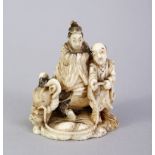 A JAPANESE MEIJI PERIOD CARVED IVORY OKIMONO OF OXEN & ATTENDANT, one figure upon the back of the