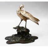 A GOOD JAPANESE MEIJI PERIOD SOLID SILVER & BRONZE OKIMONO OF AN EGRET - SIGNED GYOKO, the finely