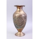 A FINE QUALITY 18TH / 19TH CENTURY IRANIAN CARVED SILVER VASE, the body of the vase carved to depict