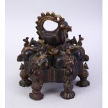 A 16TH / 17TH CENTURY ISLAMIC BRONZE SPICE HOLDER, with removable central bolt to allow opening