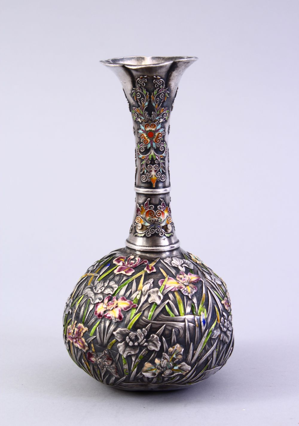 A GOOD JAPANESE MEIJI PERIOD SILVER & ENAMEL BOTTLE VASE, the vase with iris and other floral