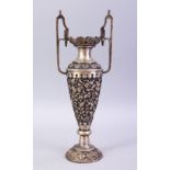 A GOOD ISLAMIC / IRANIAN SILVER ALHAMBRA STYLE SILVER VASE, the boy carved with floral decoration