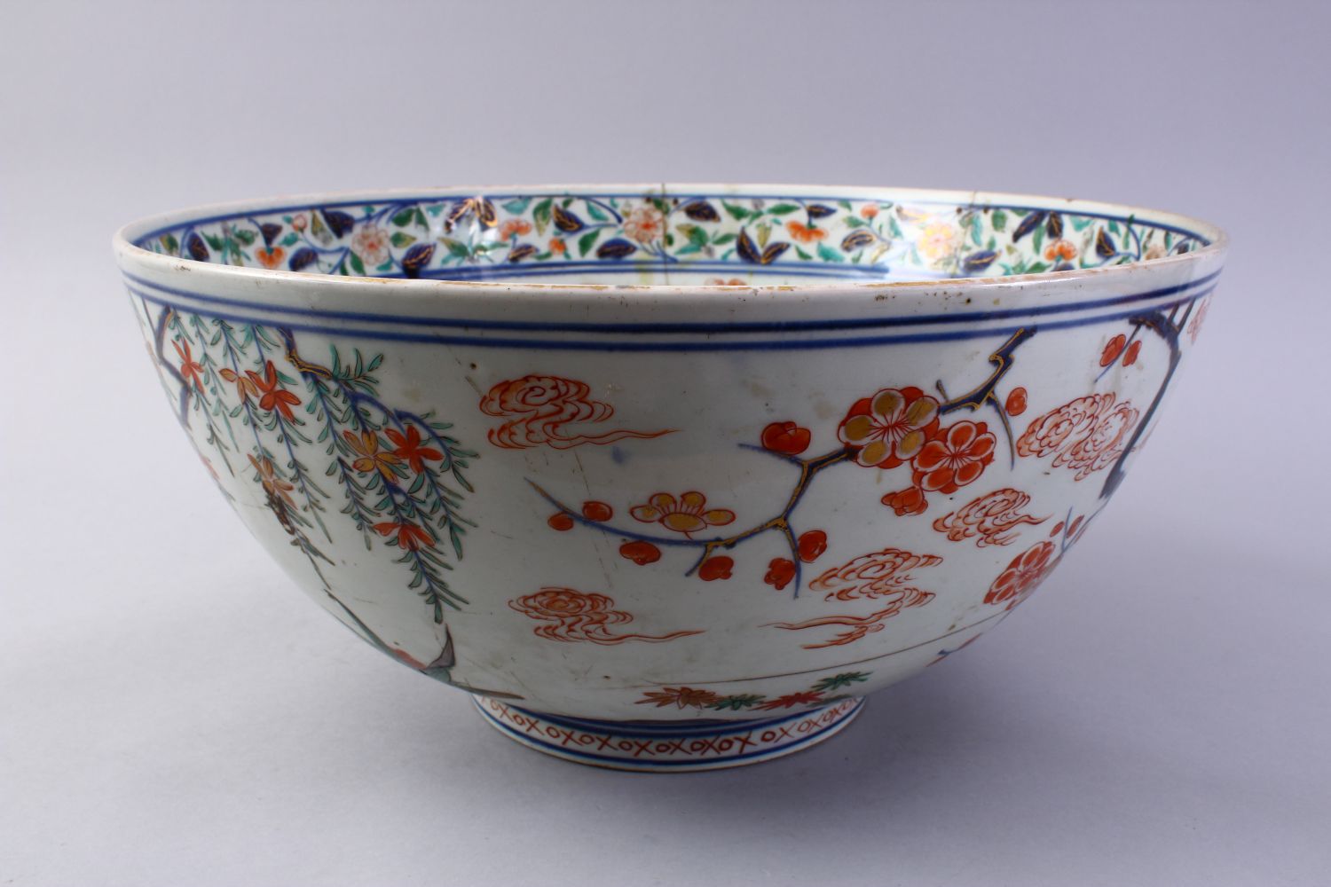 A LARGE JAPANESE MEIJI PERIOD IMARI PORCELAIN BOWL, decorated with typical imari palate, with staple - Image 2 of 6