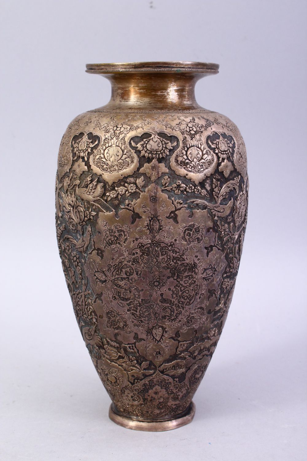 A 18TH / 19TH CENTURY IRANIAN CARVED SILVER VASE, with a multitude of decoration depicting flora and - Image 3 of 12