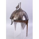 A GOOD INDIAN MUGHAL INLIAD STEEL HELMET, the helmet with silver inlays, chain mail to the verso