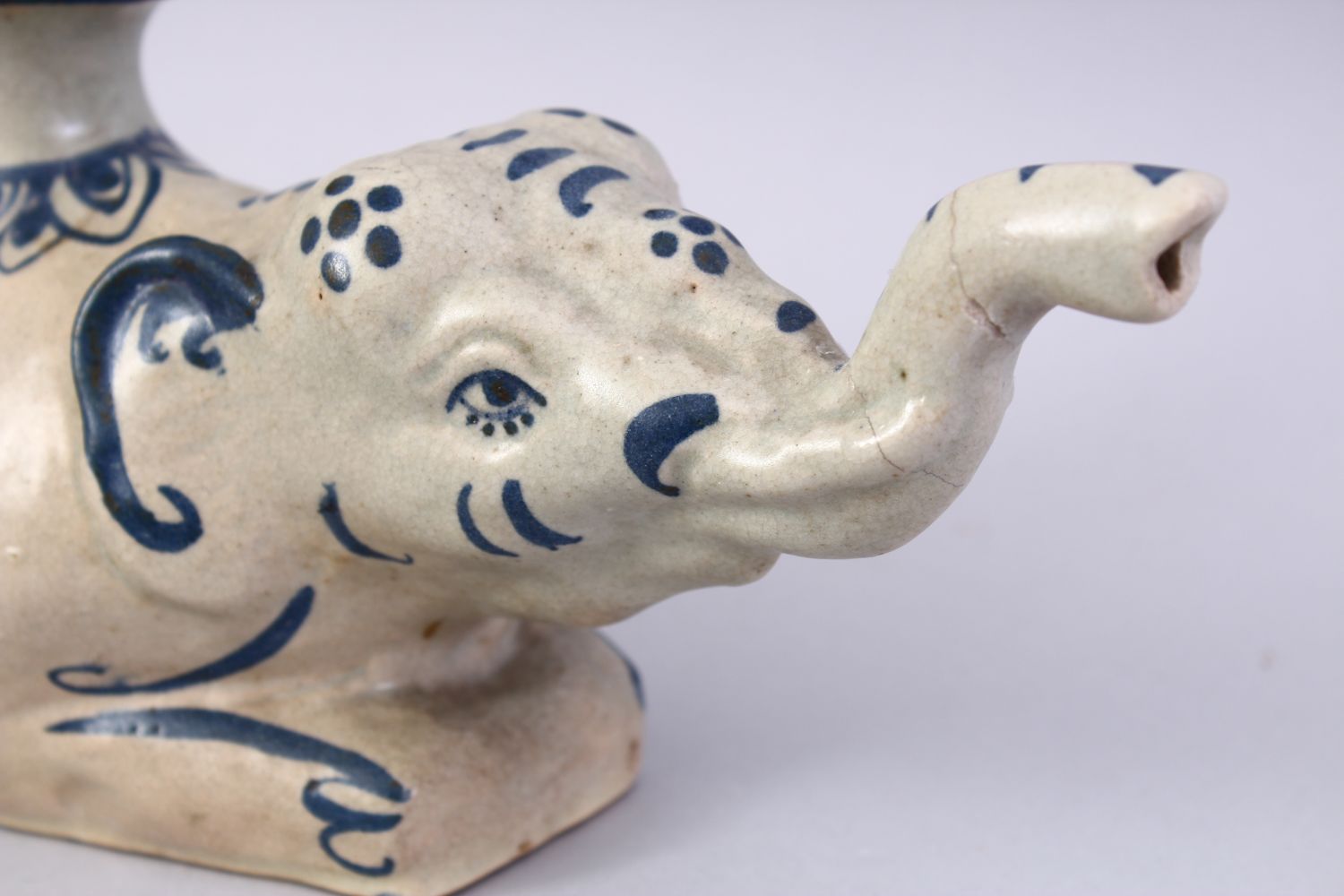 AN UNUSUAL 19TH CENTURY INDIAN POTTERY HUQQA BASE, in the form of a recumbent elephant, 28cm long. - Image 4 of 7