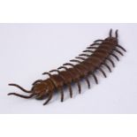 A JAPANESE BRONZE ARTICULATED BRONZE CENTIPEDE OKIMONO, the back signed, 15cm