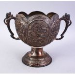 A GOOD ISLAMIC 19TH CENTURY MOULDED SILVER TWIN HANDLE JUG, The body of the jug with many panels