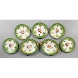 FIVE LATE 19TH CENTURY RIDGWAY PLATES, each with a floral spray to the centre within green and