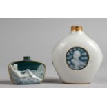 A SMALL PATE-SUR-PATE DECORATED BOTTLE VASE, and a similar Limoges perfume bottle. 4.25ins and