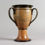 AN UNUSUAL ROYAL DOULTON COMMEMORATIVE PEDESTAL LOVING CUP, Presented to Miss M. A. McAllister and