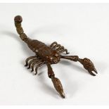 A JAPANESE MINIATURE BRONZE MODEL OF A SCORPION. 3.5ins long.