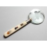 A SMALL MAGNIFYING GLASS, with shibyama handle.