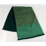 A HERMES SILK AND ANGORA GENTLEMEN'S SCARF, green ground with interlinked buckle design.