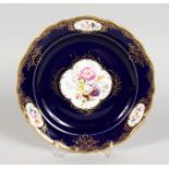 A GOOD MEISSEN PORCELAIN PLATE, rich blue ground edged in gilt, with bouquet of flowers and three