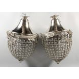 A PAIR OF PINEAPPLE SHAPED CUT GLASS AND SILVERED CEILING LIGHTS. 19ins high.