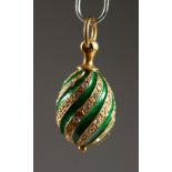 A RUSSIAN SILVER AND ENAMEL MINIATURE EGG PENDANT. 0.75ins high.