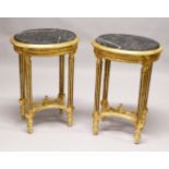 A PAIR OF FRENCH STYLE GILTWOOD ND MARBLE TOP OVAL LAMP TABLES. 2ft 5ins high x 1ft 8ins wide x