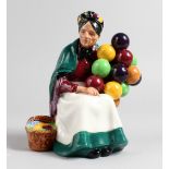 A ROYAL DOULTON FIGURINE. "The Old Balloon Seller", HN1315.