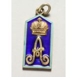 A RUSSIAN SILVER PENDANT, enamel decorated with a crown and letter "A". 1.5ins high.