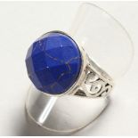 A SILVER AND LAPIS RING.