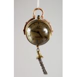 A SMALL BALL SHAPED PENDANT WATCH. 1.5ins diameter.